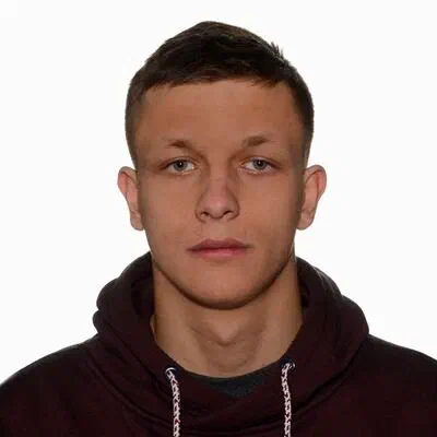 Portret kolarza torowego z polskiej drużyny młodzieżowej.